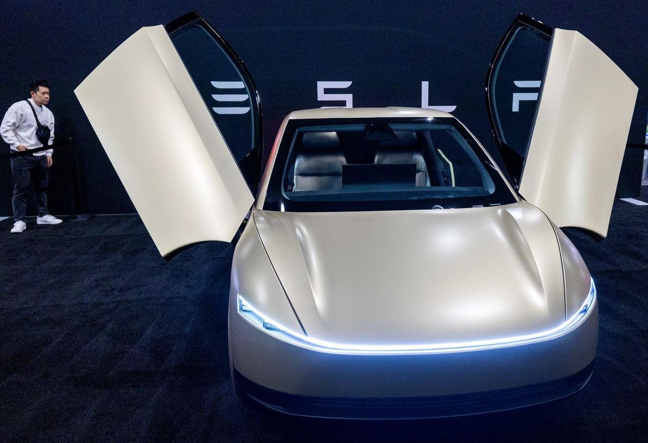 Tesla Robotaxi To Launch In June As Rivian Plans L3 Autonomy, Voice AI Tesla Robotaxi To Launch In June As Rivian Plans L3 Autonomy, Voice AI