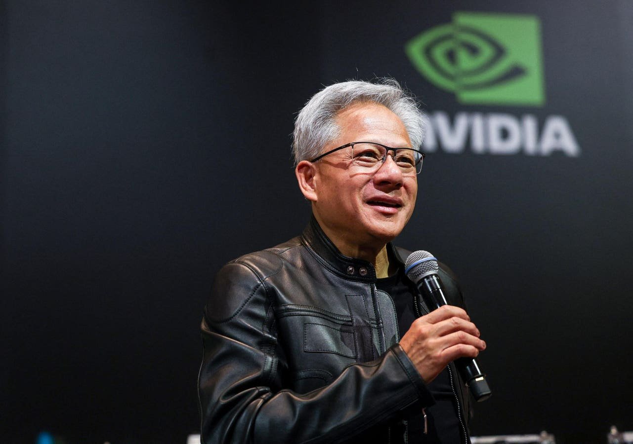 CEOs Jensen Huang And Dario Amodei On AI: Adapt Or Be Replaced CEOs Jensen Huang And Dario Amodei On AI: Adapt Or Be Replaced