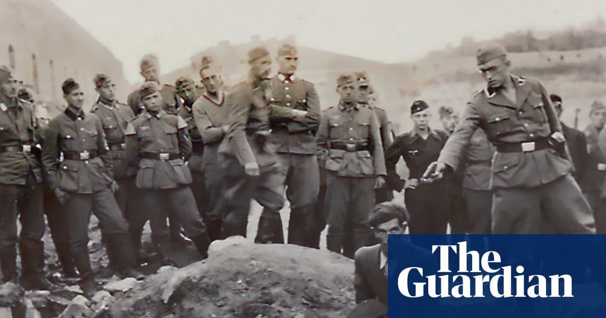 Historian uses AI to help identify Nazi in notorious Holocaust murder image | Second world war
